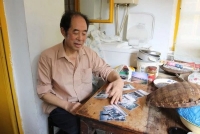他用双手织补文明之谱——记泸州纳溪孔文普（人物史料）.jpg